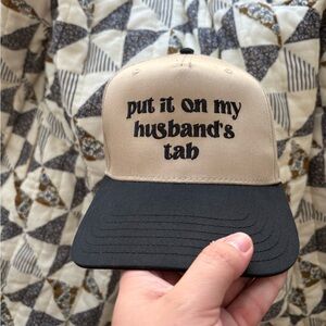 Mad hatter put it on my husbands tab trucker hat